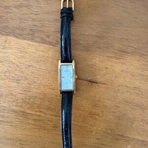 Peugeot mother of pearl faced watch, black leather